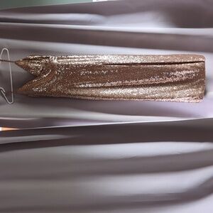 Rose gold sequin dress.